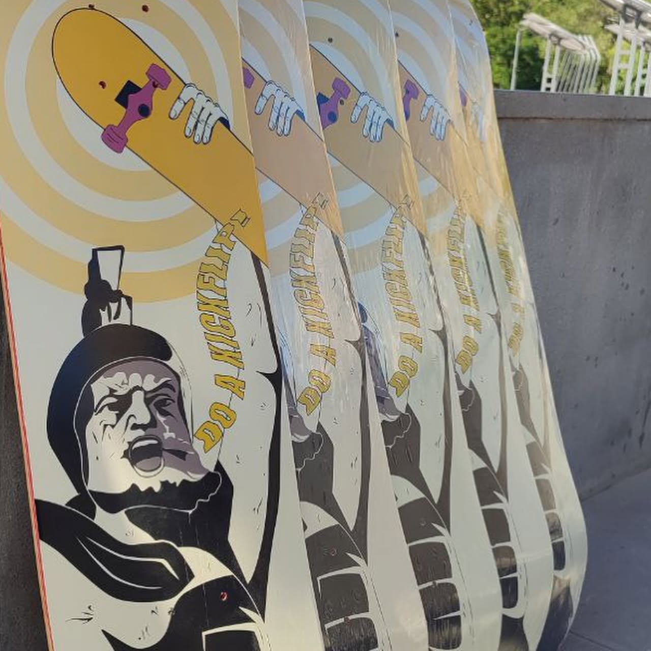 Close view of the Mamik skateboard deck artwork